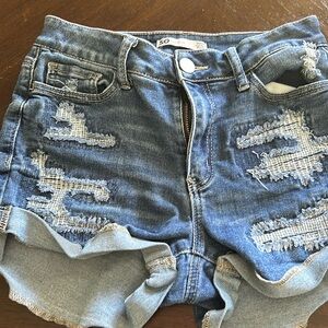 Size 7/28 high rise shorts they are used but clean and in good condition